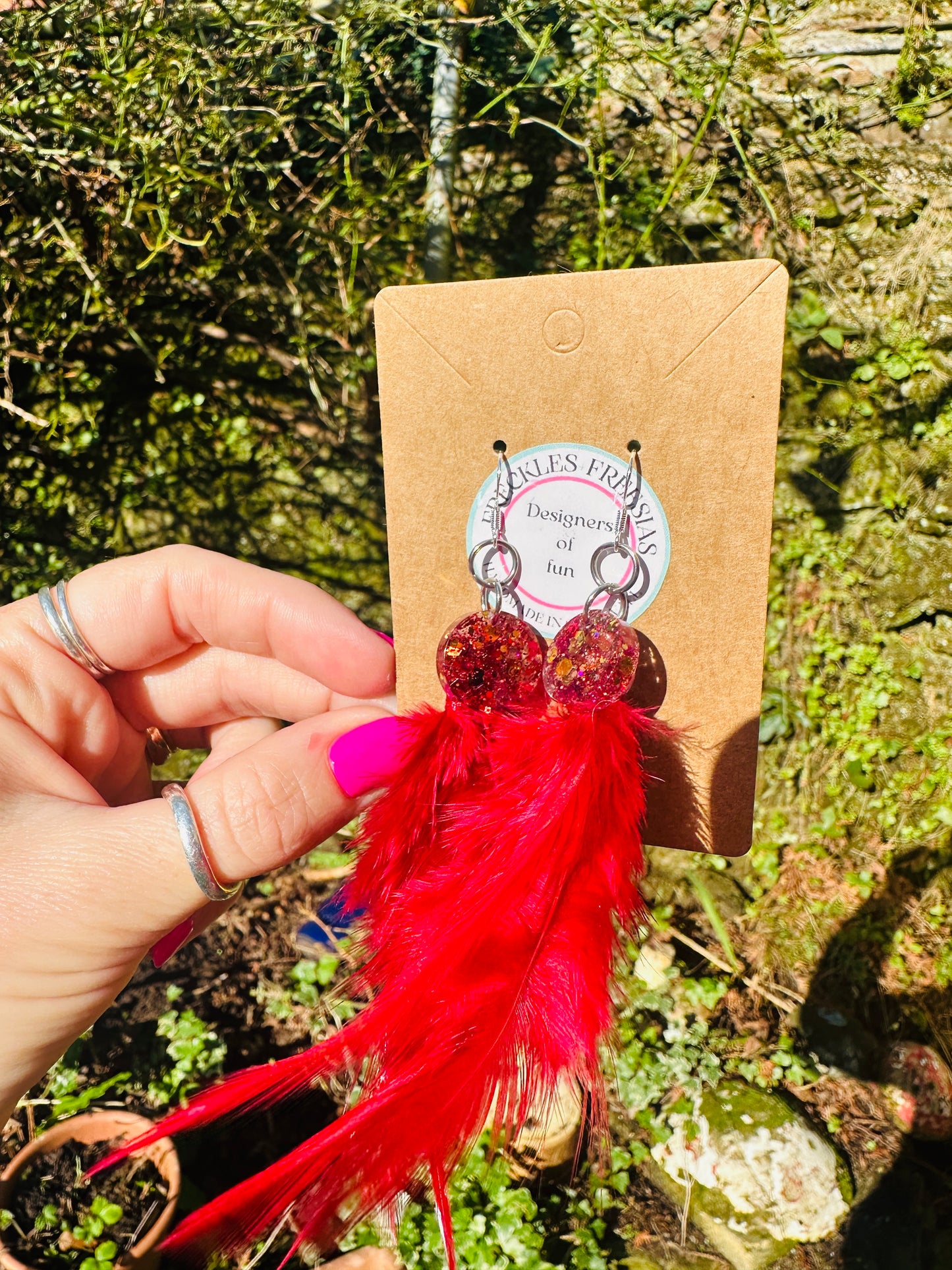 Apollo resin and feather fire red handmade earrin