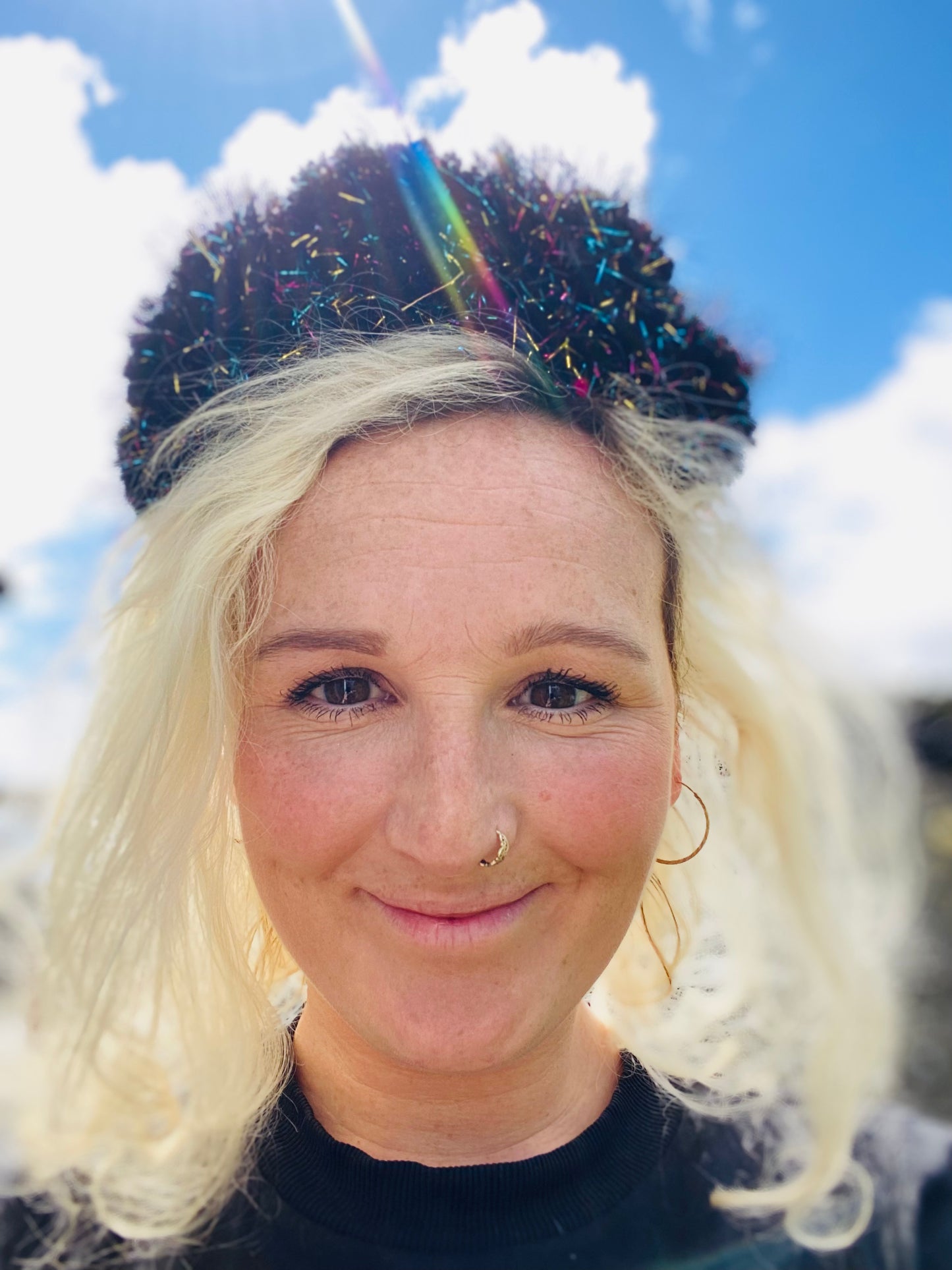 Black and rainbow sparkle pom pom headband