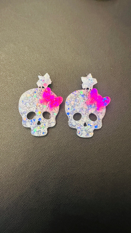 Handmade glow in the dark skull bow earrings